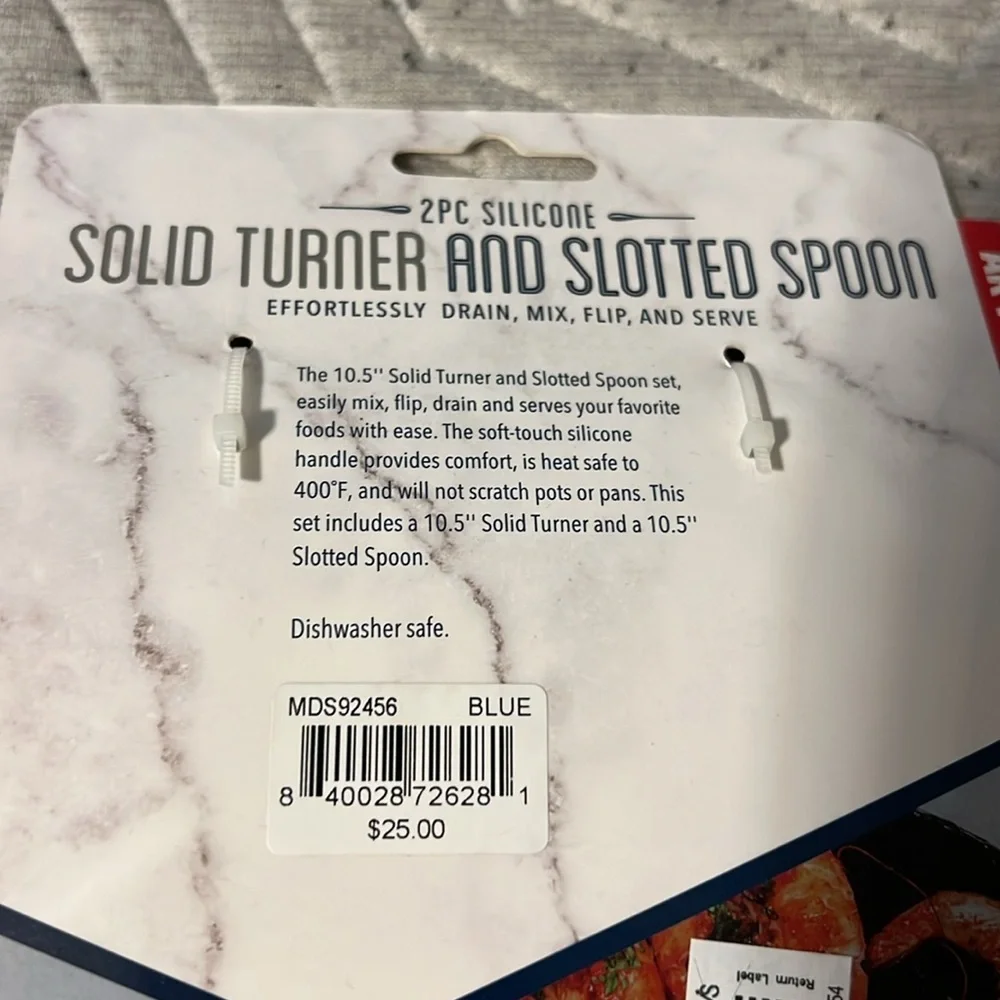 Art cook silicone solid Turner and slotted spoon and sole imposter server.